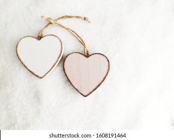 Valentine's Day. Two Hearts on Snow