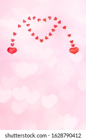 Valentines Day Or Wedding Vertical Festive Pink Background With Hearts Bokeh. Two Small Hearts Merging To One Big Heart.