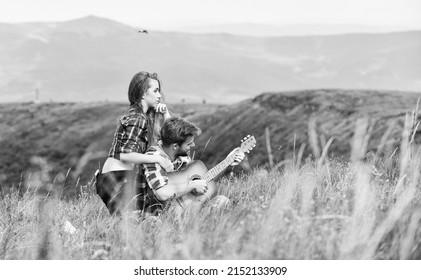 Valentines Day. Western Camping. Hiking Adventure. Happy Friends With Guitar. Friendship. Campfire Song. Country Music. Romantic Date. Men Play Guitar For Girl. Couple In Love Spend Time Together