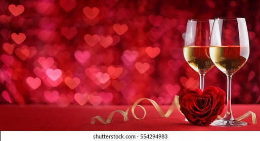 Valentines wine and rose,heart background - Shutterstock ID 554294983