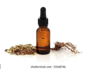 Valerian Herb Root And Apothecary Dropper Bottle, Over White Background With Reflection. Modern Day Alternative Equivalent To Valium Acting As A Tranquilizer.