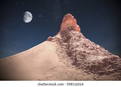 Valle De La Luna (Moon Valley) Close To San Pedro De Atacama, Chile. Night Shining Stars.