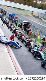 Vallelunga, Italy 5 December 2020, Aci Racing Weekend. Large Number Of Formula Racing Car Aligned On Asphalt Track In Circuit Pit Lane