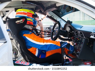 Vallelunga, Italy September 14 2019. Touring Racing Car Cockpit With Race Driver Sitting Ready For The Race Side View