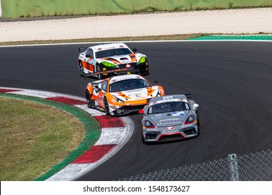 Vallelunga, Italy September 15 2019. View Of Three Touring Racing Cars Porsche Cayman Ferrari 488 And Ginetta G55 In Action During Race At Turn