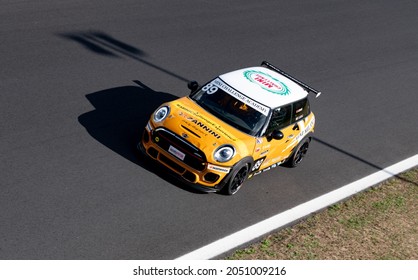 Vallelunga, Italy September 18th 2021 Aci Racing Weekend. Fast Mini Cooper Challenge Race Car On Asphalt Racetrack Spectacular High Angle View