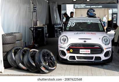 Vallelunga, Italy September 18th 2021 Aci Racing Weekend. Mini Cooper Race Car Standing In Circuit Paddock With Tire And Team People