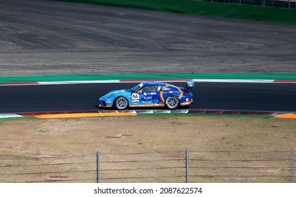 Vallelunga, Italy September 18th 2021 Aci Racing Weekend. Porsche Carrera Race Car On Circuit Racetrack Turn With Curb