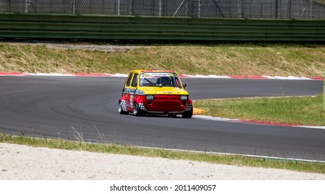 Vallelunga June 13 2021, Fx series racing. Classic old fashioned italian mini car Fiat 126 racing action on asphalt track