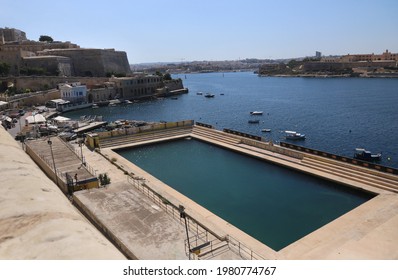 Valletta, Malta - 07.22.2019: Waterpolo pool of United Waterpolo Club Pitch at the Marsamxett Harbour waterfront.
