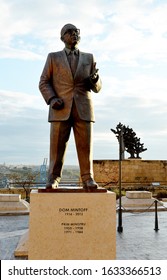 VALLETTA, MALTA - 11 JANUARY 2020: A Statue Of Malta's Long Serving Prime Minsiter, Dom Mintoff, Stands High Above The City In Castille Square.