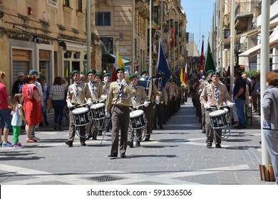 Valletta, Malta — 26 APRIL, 2015: The Traditional Parade Of Scouts In Honour Of Saint John, Protector Of The  Sovereign Military Hospitaller Order Of Saint John Of Jerusalem Of Rhodes And Of Malta 