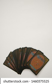 VALLETTA, MALTA - JULY 24TH, 2019: Magic: The Gathering cards on a white surface. Vertical