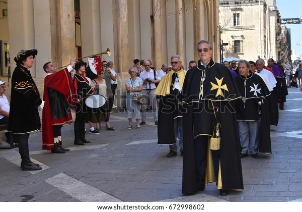 Valletta, Malta - June 25, 2017: Grand Parade in front of The Grand Master’s Palace -  historical re-enactment of Maltese Order of the Knights of St. John military parade and Valletta Fort inspection
