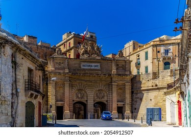 Valletta, Malta - June 7th 2016: A Car Leaving The Victoria Gate Which Was Built By The British In 1885 And Is The Only Remaining Fortified Gate Into The City.