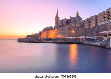 Valletta Skyline with churche of Our Lady of Mount Carmel and St. Paul's Anglican Pro-Cathedral, at dawn, Valletta, Capital city of Malta