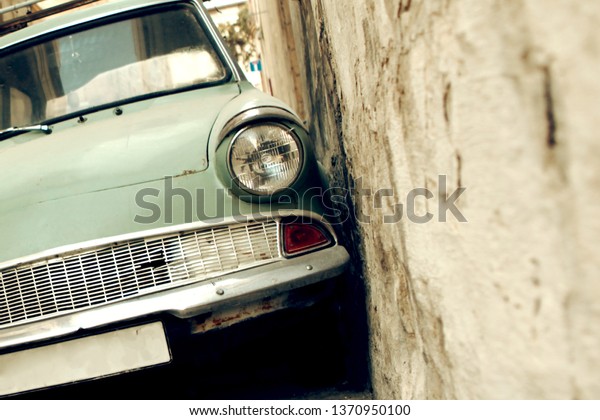 Valletta/Malta-28.04.2012:  Old vintage car stands\
in the\
street