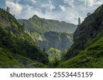 Valley in Alps scenery, Batoni Waterfalls hiking trail in Switzerland