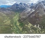 Valley between Mount Katolinat and the Buttress Range in Katmai National Park in Alaska. Aerial view of rugged and remote mountains on the Alaskan peninsula. Windy Creek. 
