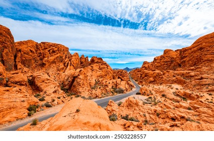 Valley of Fire State Park is a public recreation and nature preservation in Nevada (USA)  in the Mojave Desert, near Las Vegas. Panoramic wide angle view of the road in colorful red sandstone scenery. - Powered by Shutterstock