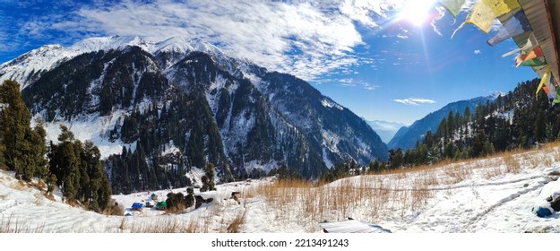 A Valley And Snow Capped Mountain Side On The Himalayan Range In India. 