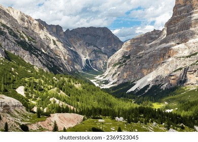 Valley Val Travenanzes and path way rock face in Tofane gruppe, Alps Dolomites mountains, Fanes national park, Italy