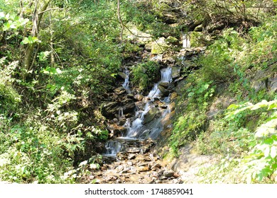 Valley Water Flowing From The Rocks In The Summer Mountains Goesan County