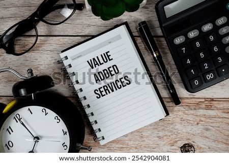 Value Added Services (VAS) text on notepad, Business and Financial concept background