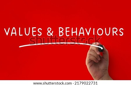 Values and behaviour text on red cover background. Business culture concept