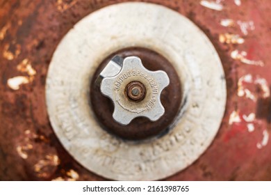 Valve Of Old Rusty Gas Cylinder Close-up, Top View.  Concept For Content About Gas, Fuel