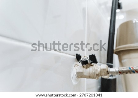 valve setup essentials, water control system components, wallmounted plumbing fixtures with fittings and hose connections, chromed wall connector featuring multiple attachment and outlet options