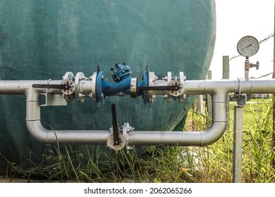 The valve system controls the water supply from a large water tank and water pressure gauge for office buildings and industrial plants for agriculture and irrigation system.