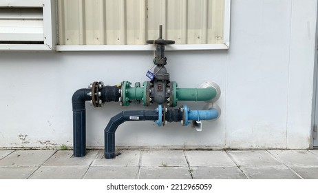 Valve And Water Pipe System With Factory Wall Background And Identify 