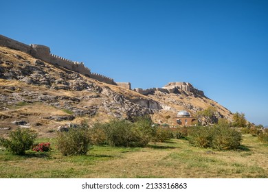Van Castle at sunny day, Van city, Eastern Anatolia, Turkey. Ancient fortress of the Urartu Kingdom known as Tushba Castle in Van, eastern Turkey. Van Kalesi
