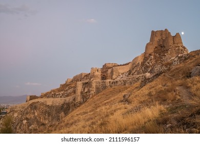 Van Castle at twilight, Van city, Eastern Anatolia, Turkey. Ancient fortress of the Urartu Kingdom known as Tushba Castle in Van, eastern Turkey. Van Kalesi