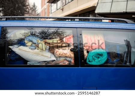 A van full of stuff, blankets, sleeping bags and stuff like that.