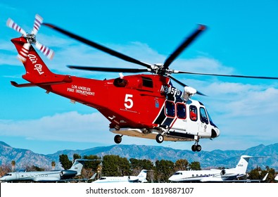 Van Nuys, California / United States - 9/22/2020: Flying LAFD Agusta Helicopter, Fire Station 114, Van Nuys Airport, 