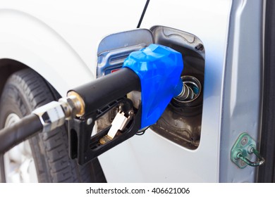 A Van Refueling At Gas Station