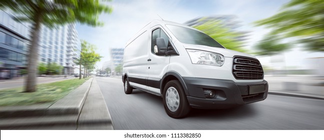 Van traveling in the city - Shutterstock ID 1113382850