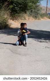 Van , Turkey - 01.05.2019 : Two Younger Brothers Hugging Each Other Playing Games