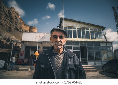 Van / Turkey - 05.04.2019: Mustache Man With Hat In Front Of The Grocer