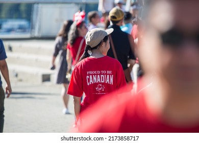 Vancouver, BC, Canada, 7 01 2022, A Man In A Crowd In A Canada Word Tshirt During Canada Day Celebrations In Downtown