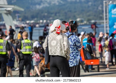 Vancouver, BC, Canada, 7 01 2022, The Crowd With Flags Near Kids Stage Event During The Canada Day Celebrations In Downtown