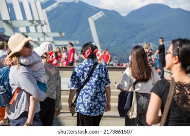 Vancouver, BC, Canada, 7 01 2022, The Crowd With Flags Near Kids Stage Event During The Canada Day Celebrations In Downtown