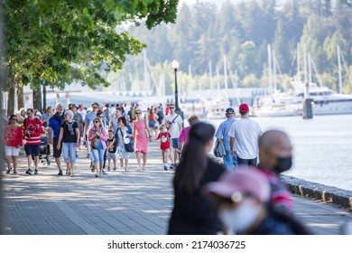 Vancouver, BC, Canada, 7 01 2022,  The Crowd Walking In The Sea Walk During The Canada Day Celebrations In Downtown