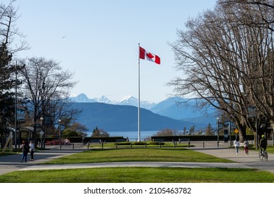 Vancouver, BC, Canada - April 5 2021 : University Of British Columbia (UBC) Campus. UBC Flag Pole.