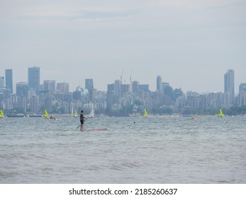 Vancouver, BC Canada - August 1, 2022: People Enjoying Cooler Temperatures At The Beach After The Heatwave On BC Day In Vancouver.