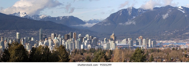 Vancouver BC Canada City Skyline And Snow Capped Mountains Panorama