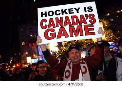 VANCOUVER, BC, CANADA - FEBRUARY 28: Canadian man celebrates Canada Hockey Team Gold Medal win at 2010 Winter Games, February 28, 2010 in Vancouver, BC, Canada