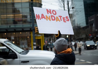 Vancouver, BC Canada January 29 2022: Anti-vaccine Protest, Trucker Rally, Anti-trudeau Demonstration With Signs Against Masks, Covid Lockdown, Restrictions, Vaccine Passports, Freedom Convoy